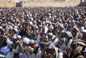 Pakistani tribesmen offer Eid Al-Fitr prayer in Chaman, a Pakistani town along Afghan border, Wednesday, Oct. 1 2008. Muslims around the world celebrate Eid Al-Fitr, which marks the end of the holy month of Ramadan. (AP Photo/Matiullah Achakzai)